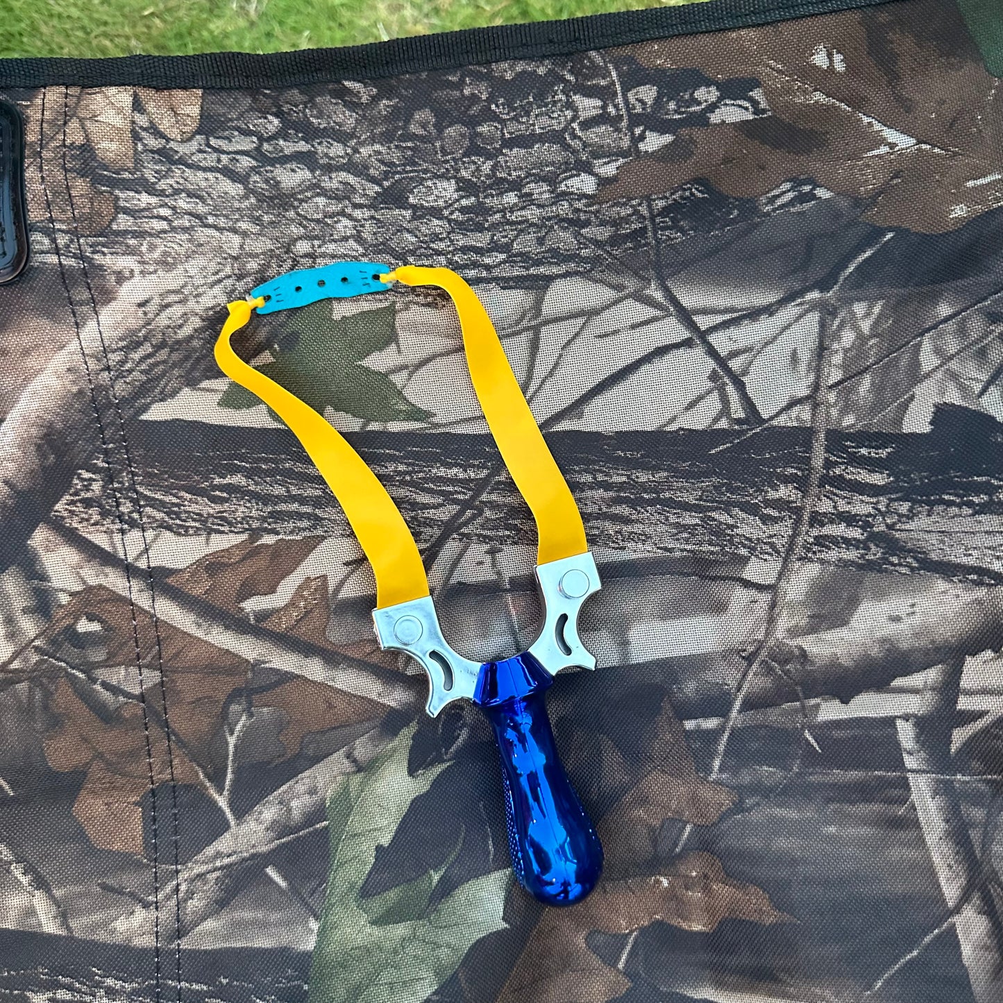 Imported slingshot with side laser