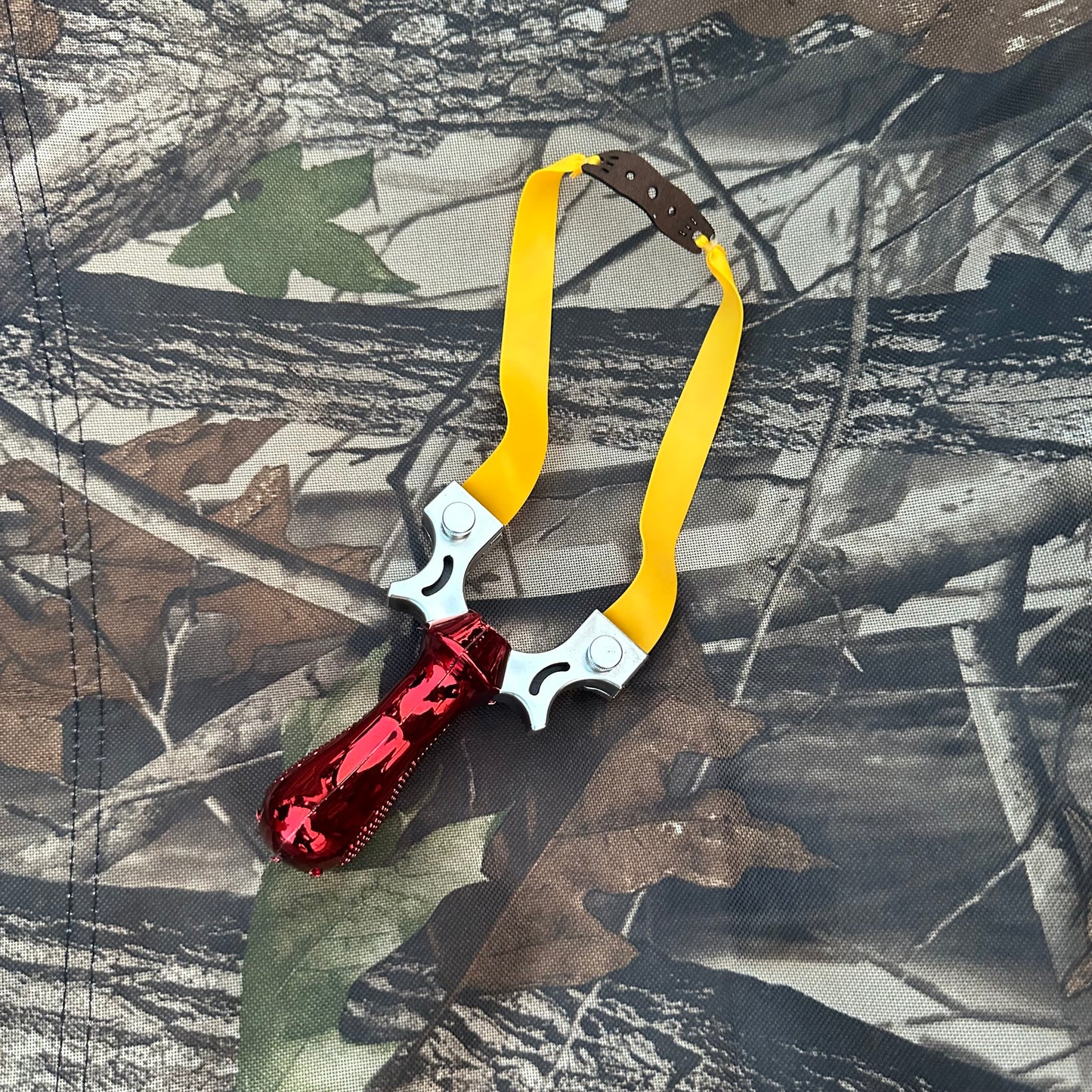 Imported slingshot with side laser