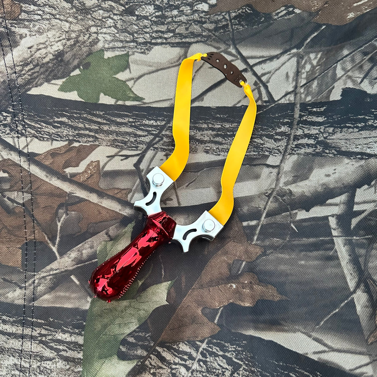 Imported slingshot with side laser